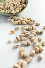 Pistachios. A scattering of pistachios on the table. Shallow depth of field, selective focus