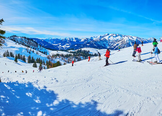 Sportsmen on ski run, Gosau, Salzkammergut, Austria