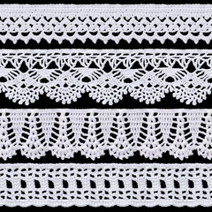 Set of white tape lace on a black background. Vintage style. Material for stylish graphic decoration.