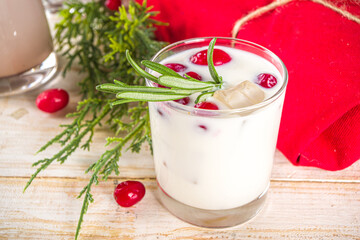 Set of different Christmas and winter drinks. An assortment of Christmas cocktails, hot and cold beverages, in cozy wooden home background with Xmas decor