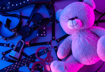 Set of erotic toys for BDSM and Teddy bear