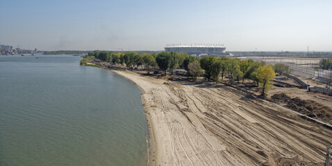 Construction of a new beach for the 2018 FIFA World Cup.New stadium is visible