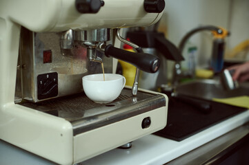 Process of preparing espresso on a professional coffee machine