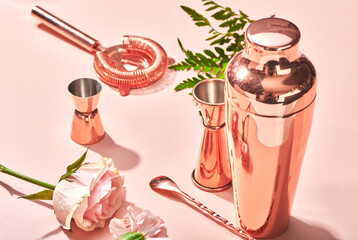 Rose Gold Barware and Cocktail Accessories on Pink