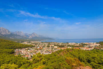 Fototapeta premium View of Kemer town on a coast of the Mediterranean sea in Antalya province, Turkey. Turkish Riviera. View from a mountain