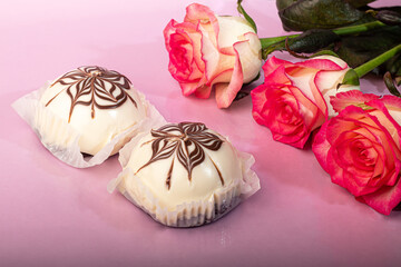 Cakes with chocolate and curd layer. Two portions. On a pink background. Birthday, holidays, sweets.