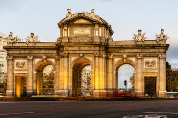 Puerta de Alcala in Madrid at sunset during Christmas