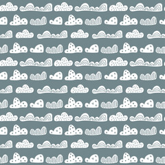 Cute doodle clouds seamless pattern in scandinavian style. Vector hand drawn kids wallpapers, holiday