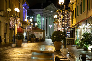 San Dona di Piave christmas illumination  in the evening with Duomo church cathedral in background