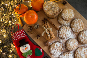Homemade butter cookies on a table. Top view photo of fresh baked biscuits. Christmas menu ideas.
