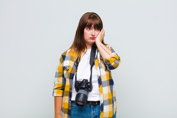 plus size woman feeling bored, frustrated and sleepy after a tiresome, dull and tedious task,...
