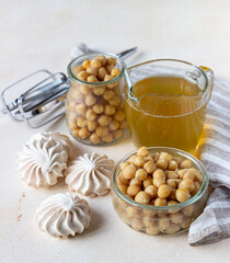 Vegan meringue, boiled chickpea and aquafaba. Vegan cooking concept. Healthy product. Substitute egg for vegan recipes.