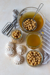 Vegan meringue, boiled chickpea and aquafaba. Vegan cooking concept. Healthy product. Substitute egg for vegan recipes. Top view.