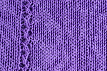 knitted background of lilac color, knitting concept. A hobby .Made by hand.