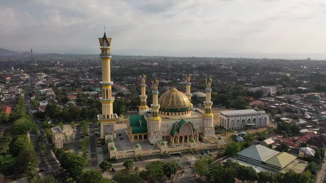 Exterior Of Islamic Center NTB With Mataram City At Daytime In Lombok, Indonesia. - aerial