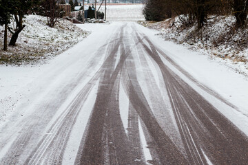 road in winter, tire tread mark on the snow..icy condition.Snow.Winter tire