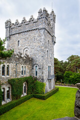 Fototapeta premium Glenveagh Castle, Donegal in Northern Ireland. Beautiful park and garden in Glenveagh National Park, second largest park of the country. Gleann Bheatha in Irish language