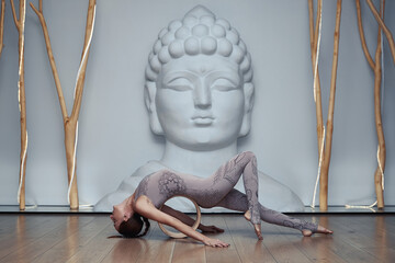 Young Woman Doing Yoga Exercise in Studio.