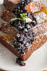 French toast. Homemade French toast with crispy Bacon, butter and maple syrup. Classic American breakfast or brunch favorite. Made from scratch French toast with bacon, butter and maple syrup.