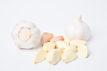 Bunch of fresh garlic isolated on white background. Selective focus.