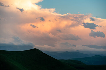 Naklejka premium Clouds at dawn sun rays