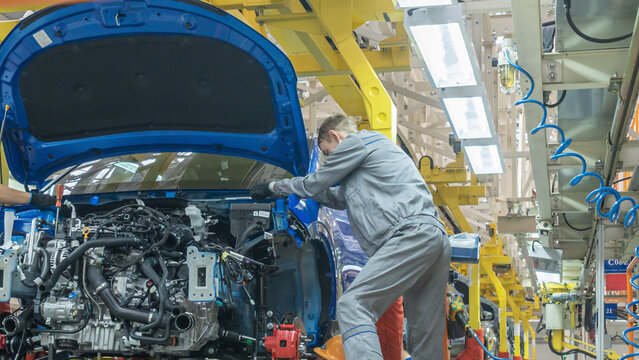 A car being manufactured on an assembly line. Car production line. Industry concept.