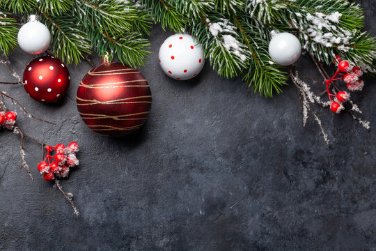Christmas greeting card with fir tree and decor