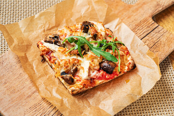 slice of italian pizza in the pizzeria