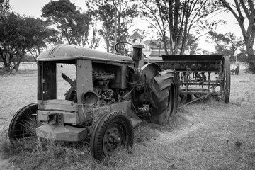 Fototapeta na wymiar Old harvest machine black and white