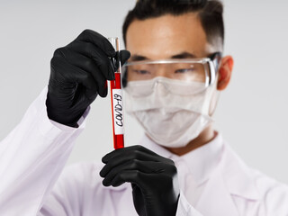 black gloves test tube with blood examination diagnostics analyzes technology