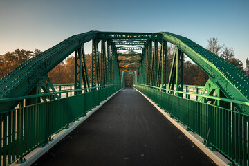 Green bridge to the Bolko island in Opole in autumn scenery