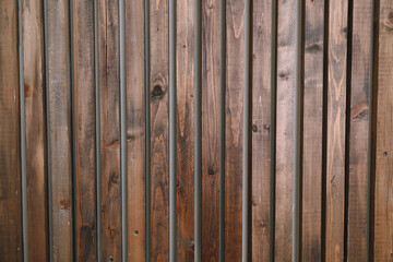 Brown wooden planks interior. Natural wall decoration background.