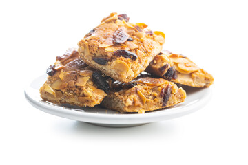 Crunchy cereal cookies with nuts and raisins isolated