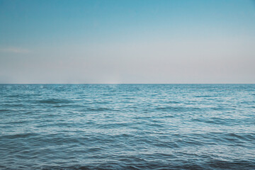 Fototapeta na wymiar Riple Sea Ocean And Blue Sky Background