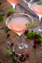 Cocktails. Alcoholic Drinks made with gin, vodka, rum or whiskey mixed with soda water, fruit juices and garnishes with limes and cherries. Classic American bar drinks.