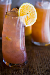 Cocktails. Alcoholic Drinks made with gin, vodka, rum or whiskey mixed with soda water, fruit juices and garnishes with limes and cherries. Classic American bar drinks.