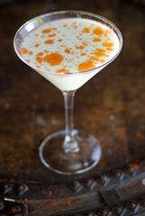 Cocktails. Traditional American drinks made by bartenders or mixologists in speakeasy or upscale bars and taverns. Cocktails served in chilled cocktail glasses and garnished with fruit.