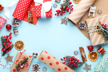 Fototapeta na wymiar Gift boxes with ornaments on blue background