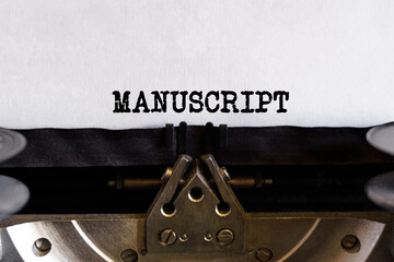 Vintage typewriter with printed text - MANUSCRIPT, on a sheet of paper