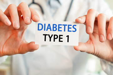 Doctor holding a card with text DIABETES TYPE 1, medical concept