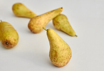 sweet fresh ripe pears on gray background