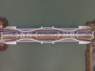 Aerial drone video of the Enneus Heermabrug in Amsterdam, The Netherlands going to Ijburg and...
