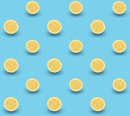 Repeated seamless pattern of many sliced ripe lemons on light blue background.