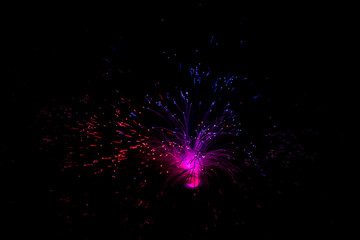 Optical fiber network cable on black background.