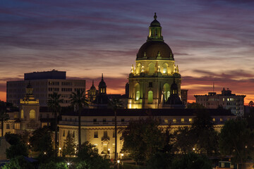 Fototapeta na wymiar Image showing the Pasadena City Hall in the foreground photographed during the civil twilight. Pasadena is located in Los Angeles County, California.