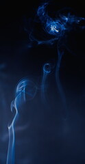 Fototapeta premium Abstract photographs of billowing smoke swirling and moving in the air.