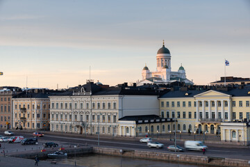 Scenic night view of the Old Town architecture and pier and Lutheran Christian Cathedral Church at the Senate Square in Helsinki, Finland, panoramic Presidential house.View Of Evening City Uspenski.