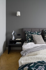 Elegant bedroom with gray wall