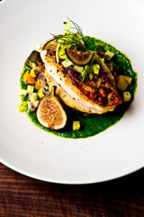 Chicken breast, pan seared to a crispy golden brown in brown butter and served with farm fresh organic vegetables: carrots, Brussels sprouts and green beans. Classic American restaurant favorite.