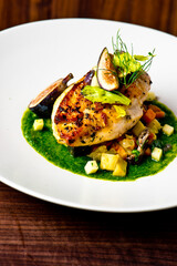 Chicken breast, pan seared to a crispy golden brown in brown butter and served with farm fresh organic vegetables: carrots, Brussels sprouts and green beans. Classic American restaurant favorite.